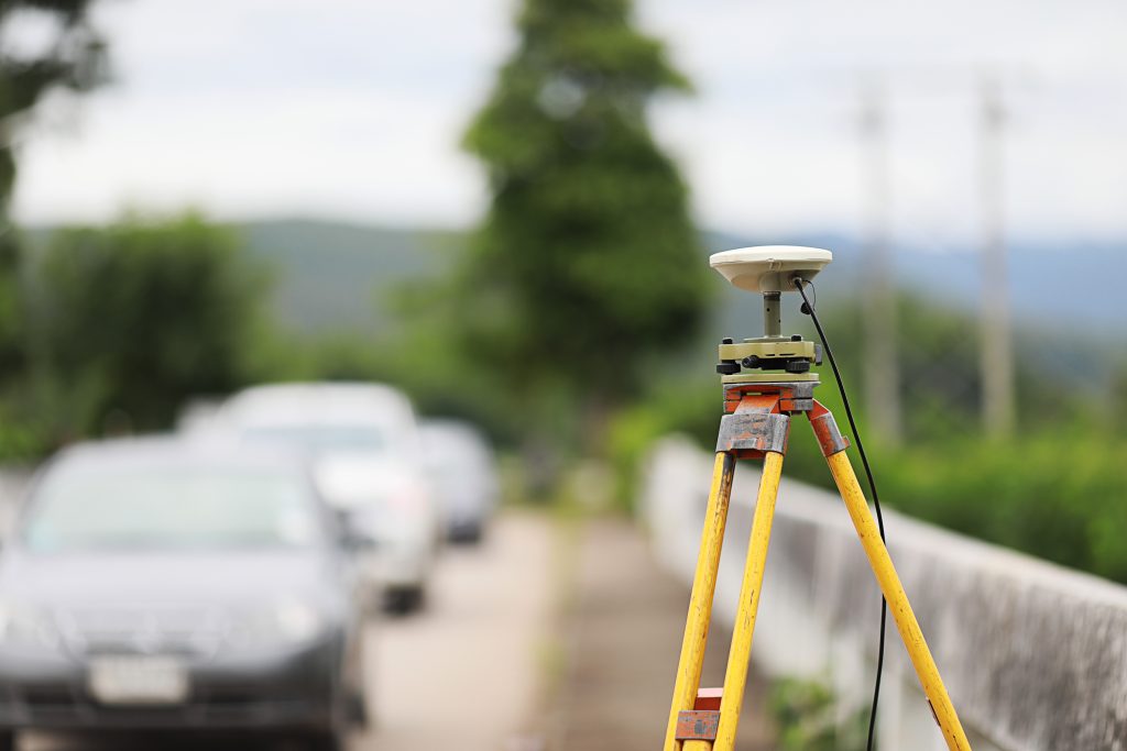 GPS surveying in field, Global Positioning System.