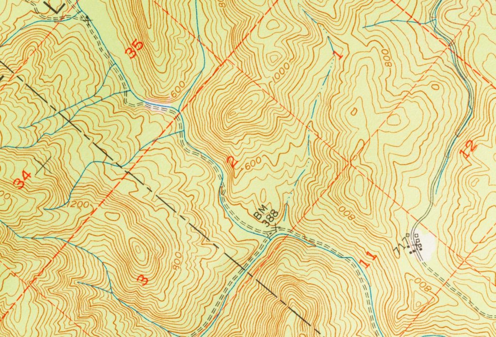 Green and Red Topographic Map with Terrain Relief.