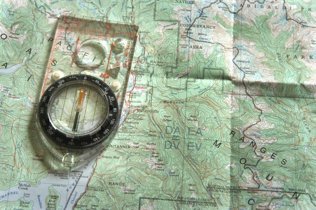 compass and a topographic map
