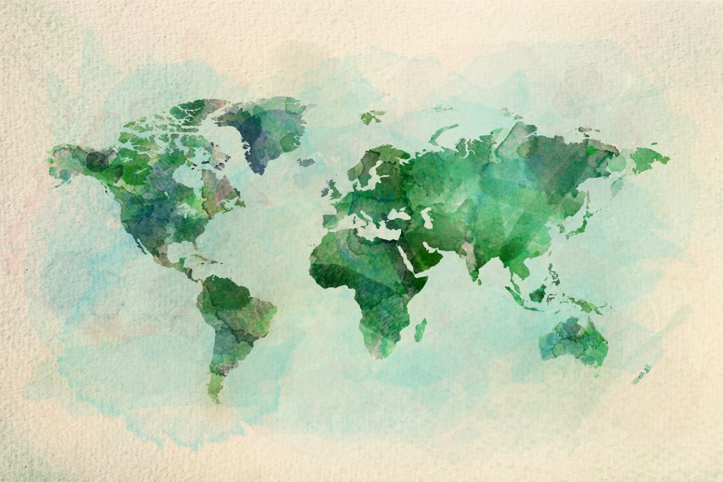 Watercolor vintage world map in green colors on paper texture. Colorful artistic image of Earth's lands.